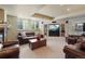 Finished basement with a fireplace, built-in entertainment center, and comfortable seating at 20234 E Lake Cir, Centennial, CO 80016