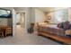 Comfortable bedroom featuring natural light and view, with plush carpeting at 20234 E Lake Cir, Centennial, CO 80016