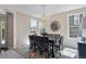 An elegant dining room with modern decor, and a crystal chandelier for a bright ambiance at 20234 E Lake Cir, Centennial, CO 80016