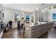 Spacious kitchen with an island, stainless steel appliances, and natural light at 20234 E Lake Cir, Centennial, CO 80016