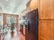 Bright kitchen featuring wood cabinets, modern appliances, and a cozy dining area at 3002 E Long S Cir, Centennial, CO 80122