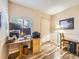 Bright office space featuring two monitors and a closet at 3002 E Long S Cir, Centennial, CO 80122