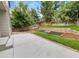 Landscaped backyard with patio and fire pit at 9431 Cove Creek Dr, Highlands Ranch, CO 80129