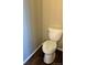 Powder room including a toilet and flooring at 3903 S Quemoy Ct, Aurora, CO 80018