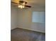 Bedroom with carpet, ceiling fan, and natural light at 3903 S Quemoy Ct, Aurora, CO 80018