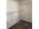 Walk-in closet includes shelving for optimal storage and carpeted floors at 3903 S Quemoy Ct, Aurora, CO 80018