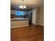Open dining area adjoining the modern kitchen, with plenty of space for Gathering gatherings at 3903 S Quemoy Ct, Aurora, CO 80018