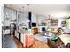 Open layout showcasing the kitchen, living room, and cohesive design elements at 11699 Pink Phlox Dr, Parker, CO 80134