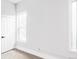 Bright bedroom with large window and neutral walls at 1838 Race St, Denver, CO 80206