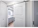 Bathroom featuring a modern vanity, updated fixtures, and a sliding barn door at 9340 E Center Ave # 8B, Denver, CO 80247