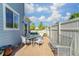 Charming backyard with brick paved patio, garden and white picket fence at 9102 W 107Th Pl, Broomfield, CO 80021