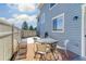 Backyard patio features brick pavers and a charming outdoor dining area at 9102 W 107Th Pl, Broomfield, CO 80021