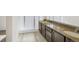 Bathroom boasts double sinks, granite countertop and a glass enclosed shower at 9102 W 107Th Pl, Broomfield, CO 80021