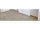 Bedroom image showing a closet and door with neutral carpet at 9102 W 107Th Pl, Broomfield, CO 80021