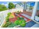 Landscaped front yard with stone paths, mulch, and a variety of plants enhancing curb appeal at 9102 W 107Th Pl, Broomfield, CO 80021