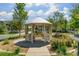 Community gazebo surrounded by lush landscaping at 9102 W 107Th Pl, Broomfield, CO 80021
