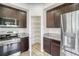 Spacious pantry with shelving, adjacent to the kitchen, offering ample storage at 9102 W 107Th Pl, Broomfield, CO 80021