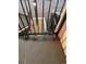 Four lockboxes on the stairway railing at 10650 E Tennessee Ave # 101, Aurora, CO 80012