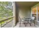 Cozy balcony with outdoor seating, perfect for relaxing and enjoying the view at 7418 S Quail Cir, Littleton, CO 80127