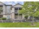Beautiful multi-story building boasting stone accents and inviting outdoor balconies at 7418 S Quail Cir, Littleton, CO 80127