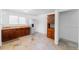 A kitchen with wooden cabinets and stainless steel appliances at 7845 Conifer Rd, Denver, CO 80221