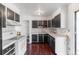 An updated kitchen features modern cabinets and stainless steel appliances at 7845 Conifer Rd, Denver, CO 80221