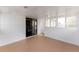 A view from the sunroom to the eat-in kitchen at 7845 Conifer Rd, Denver, CO 80221