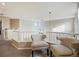 Sitting area on upper floor landing with matching chairs at 17127 Yellow Rose Way, Parker, CO 80134