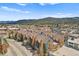 Stunning aerial view of the condos surrounded by a charming mountain town and scenic mountain views at 100 S Park Ave # E312, Breckenridge, CO 80424