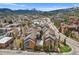 Stunning aerial view of the multi-unit property with mountain views and beautiful surroundings in Breckenridge at 100 S Park Ave # E312, Breckenridge, CO 80424