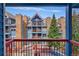 Balcony view showing exterior of the building, blue siding and brick accents at 100 S Park Ave # E312, Breckenridge, CO 80424