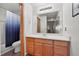 Bright bathroom with a large mirror, ample cabinet space, and a shower-tub combination at 100 S Park Ave # E312, Breckenridge, CO 80424