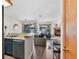 Living room with open floor plan to the kitchen and cozy fireplace at 100 S Park Ave # E312, Breckenridge, CO 80424