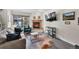 Comfortable living room with a cozy fireplace and stylish decor creates a relaxing ambiance at 100 S Park Ave # E312, Breckenridge, CO 80424