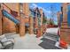 Outdoor grill and seating area among brick columns at 100 S Park Ave # E312, Breckenridge, CO 80424