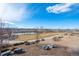 Scenic view of community amenities like a playground and park, set against a backdrop of a vibrant blue sky at 11250 Florence St # 28F, Commerce City, CO 80640
