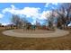 Outdoor playground in a common area provides a fun and safe recreational space for children at 11250 Florence St # 28F, Commerce City, CO 80640