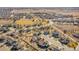 Expansive aerial view of a well-maintained community, showcasing the home's prime location and neighborhood amenities at 9912 Bradbury St, Firestone, CO 80504