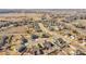 Aerial view of the neighborhood featuring the home, nearby streets, and surroundings at 9912 Bradbury St, Firestone, CO 80504