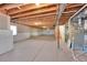 Unfinished basement space ready to be customized with open ceiling at 9912 Bradbury St, Firestone, CO 80504