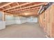 Spacious unfinished basement area with exposed ceiling perfect for customization at 9912 Bradbury St, Firestone, CO 80504