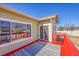 View of the rear exterior showing the sliding glass door leading to the deck at 9912 Bradbury St, Firestone, CO 80504