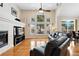 Bright living room with hardwood floors and a view of the neighborhood at 10843 W Hinsdale Dr, Littleton, CO 80127