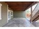 Spacious outdoor patio area with exposed beams, perfect for entertaining guests at 19503 W 58Th Pl, Golden, CO 80403