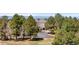 Expansive property with mature trees and circular driveway offers privacy and seclusion at 97 S Coolidge St, Aurora, CO 80018