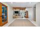 Inviting foyer with wood accents and stone fireplace wall welcomes you into this cozy home at 97 S Coolidge St, Aurora, CO 80018