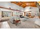 Open-concept living area with a soaring ceiling and seamless flow to the kitchen and dining area at 97 S Coolidge St, Aurora, CO 80018