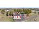 Aerial view of the property showing several buildings and landscaping at 97 S Coolidge St, Aurora, CO 80018