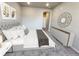 Elegant bedroom showcasing a plush bed, stylish decor, and contemporary furnishings at 6153 N Ceylon St # 303, Denver, CO 80249