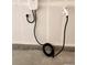 EV charging station installed on a garage wall for convenient at-home electric vehicle charging at 6153 N Ceylon St # 303, Denver, CO 80249